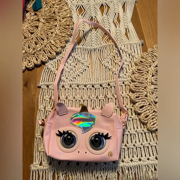 Light pink pleather unicorn purse (switch inside that makes eyes open & close) - Picture 1 of 5